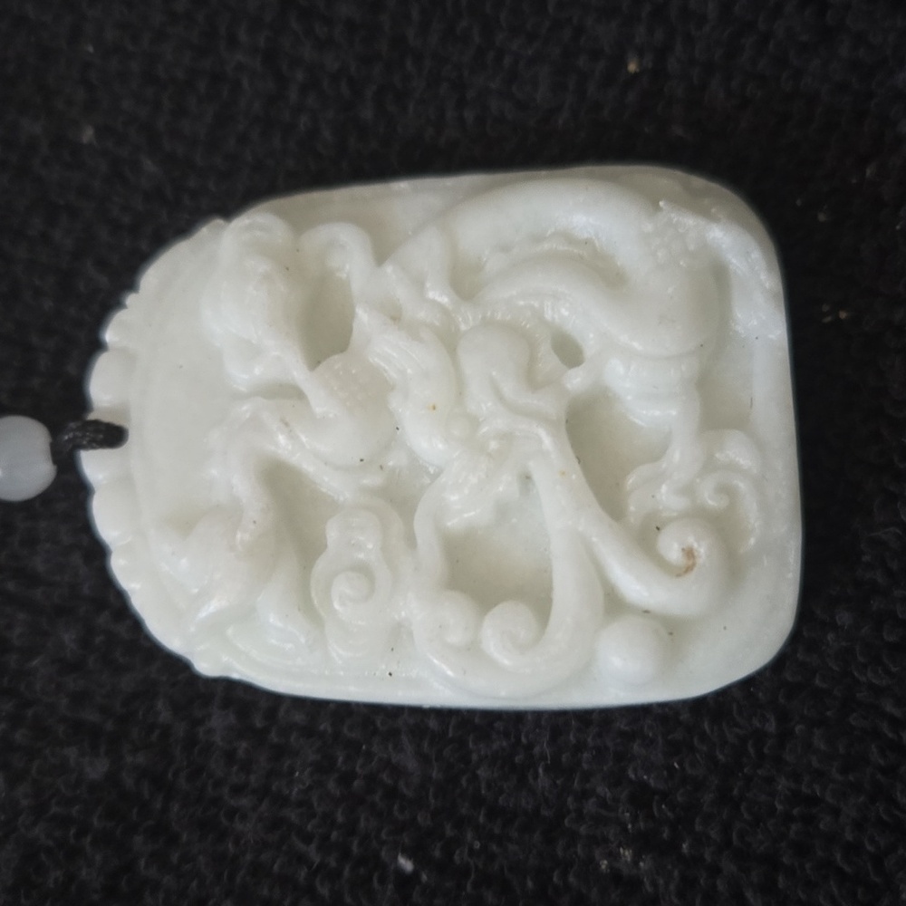 White dragon jade pendant